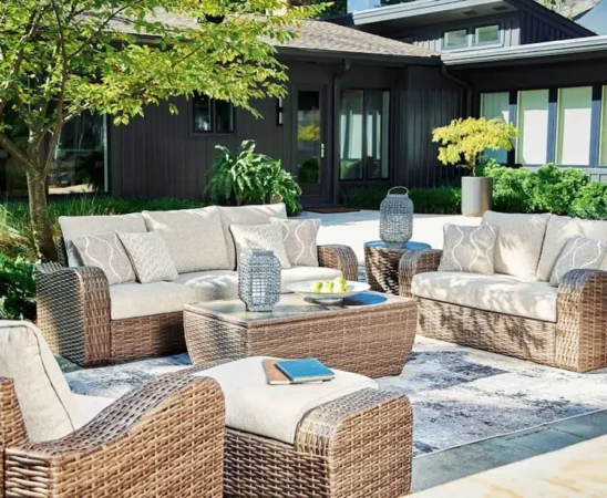 Cozy outdoor patio with wicker furniture.