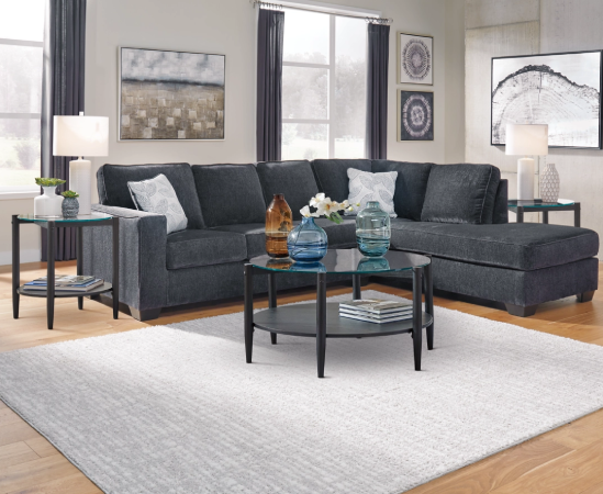 Modern gray sectional sofa in stylish living room.