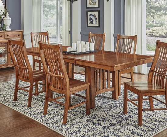Wooden dining set with eight chairs.