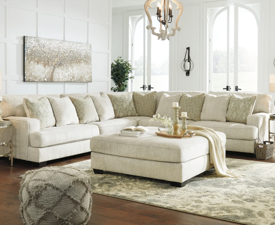 Elegant beige sectional sofa in stylish living room.