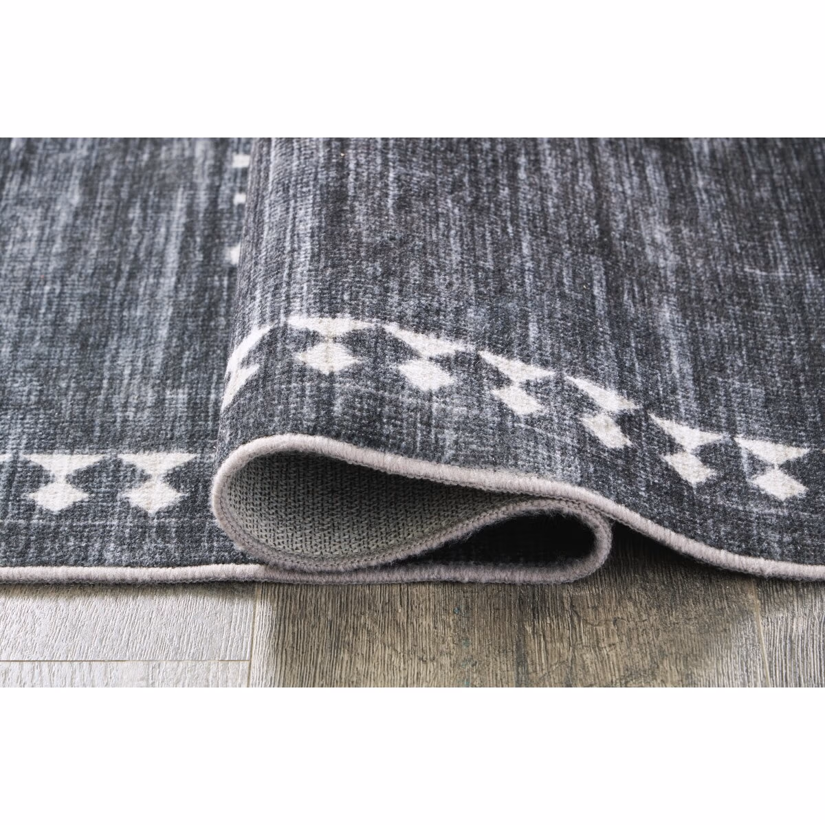 Arloman 5' x 7' Washable Rug - Image 5