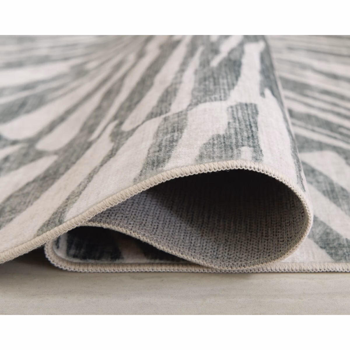 Verland Washable 7'6" x 9'6" Area Rug - Image 5